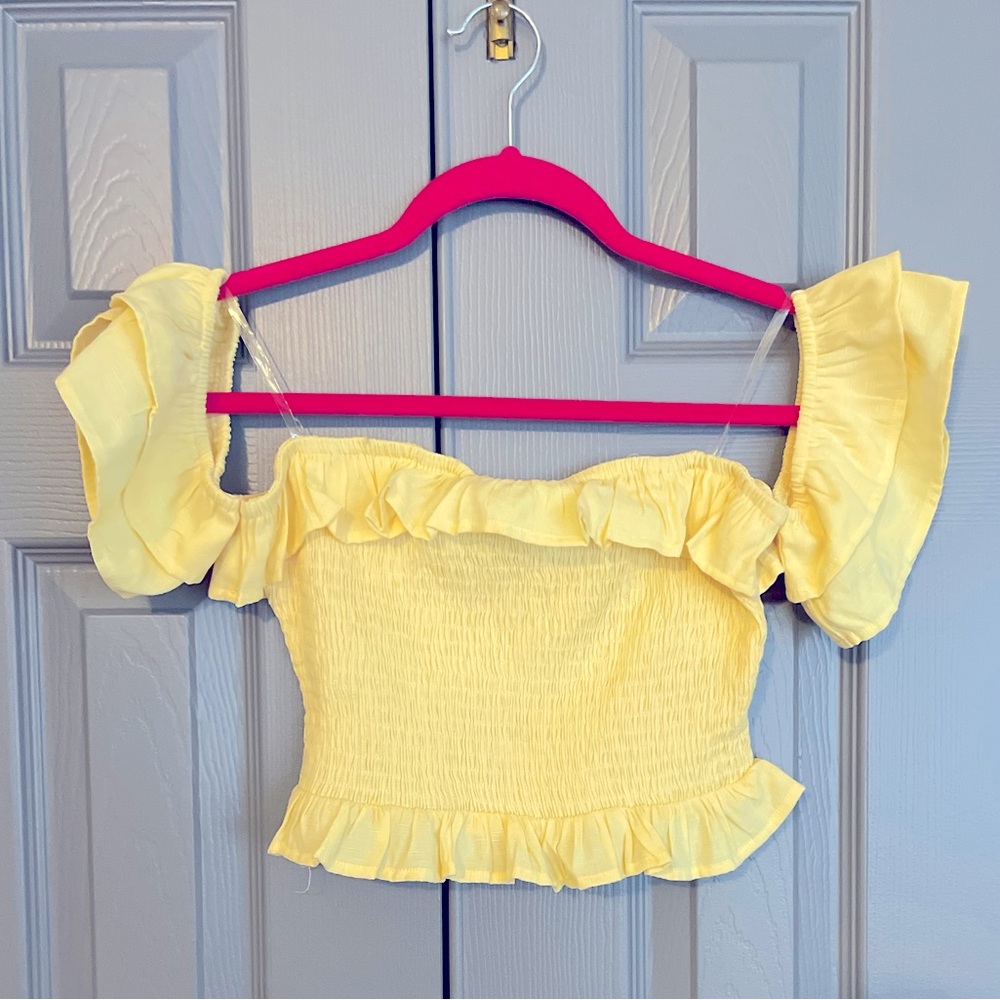 Yellow off the shoulder cropped top. Great condition. Never worn. Size medium